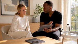 Dentist consulting patient on dental restoration